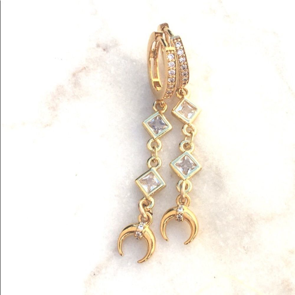 Gold hoop earrings with celestial zodiac moon charms